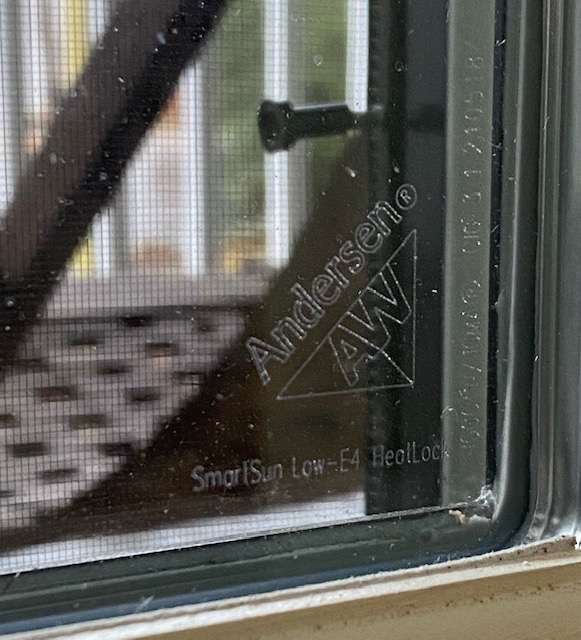 Andersen window logo etched into glass