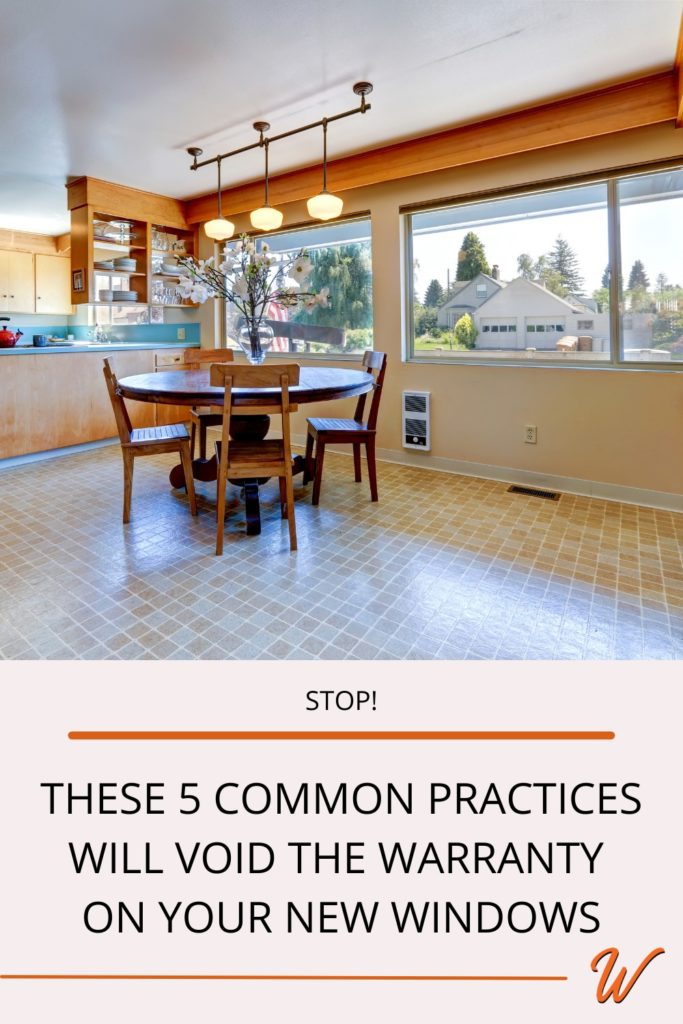 kitchen nook with a blue countertop and large white picture windows captioned with "STOP! These 5 common practices will void the warranty on your new windows"